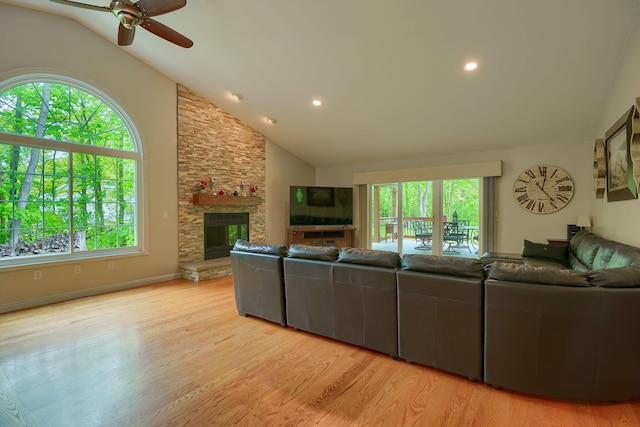 1494 Old Carriage Ct, Canal Winchester, OH 43110 - living room featuring a fireplace, light wood-style floors, ceiling fan, recessed lighting, and high vaulted ceiling