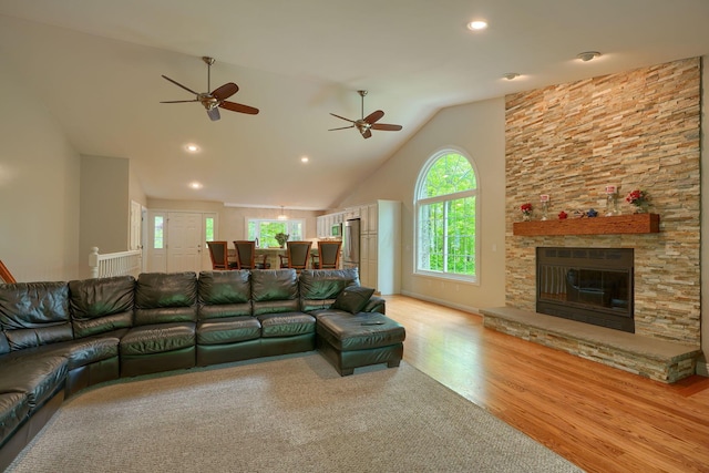 1494 Old Carriage Ct, Canal Winchester, OH 43110 - living room with wood finished floors, recessed lighting, high vaulted ceiling, a fireplace, and a ceiling fan