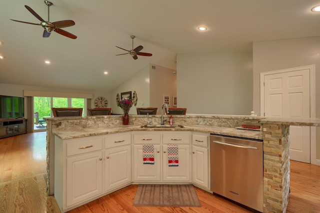 1494 Old Carriage Ct, Canal Winchester, OH 43110 - kitchen featuring dishwasher, a sink, a ceiling fan, open floor plan, and light wood-type flooring