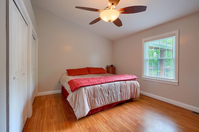 1494 Old Carriage Ct, Canal Winchester, OH 43110 - bedroom with baseboards, light wood finished floors, a closet, ceiling fan, and lofted ceiling