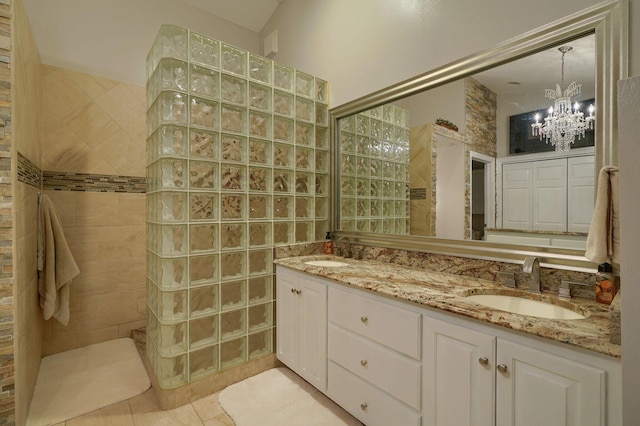 1494 Old Carriage Ct, Canal Winchester, OH 43110 - bathroom with walk in shower, a chandelier, double vanity, and tile patterned floors