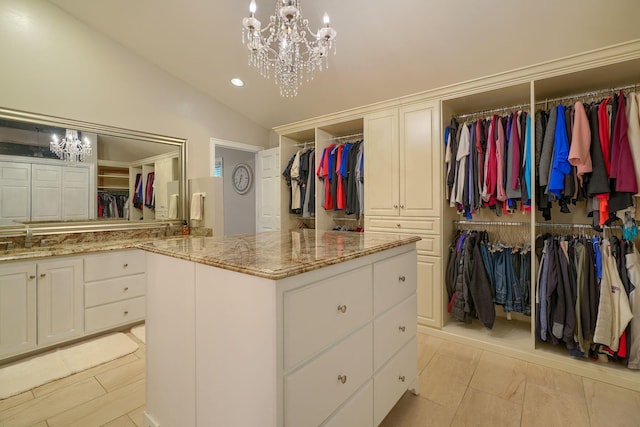 1494 Old Carriage Ct, Canal Winchester, OH 43110 - walk in closet with a chandelier, lofted ceiling, and a sink