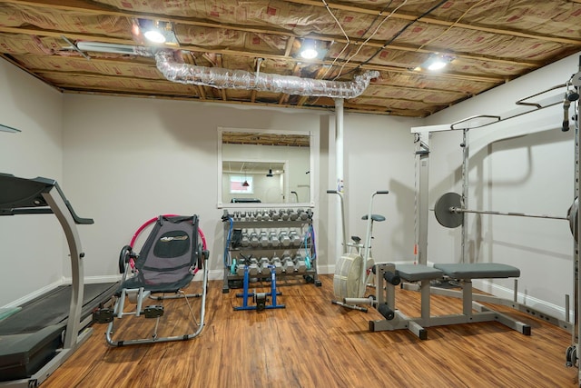 1494 Old Carriage Ct, Canal Winchester, OH 43110 - exercise area featuring wood finished floors and baseboards