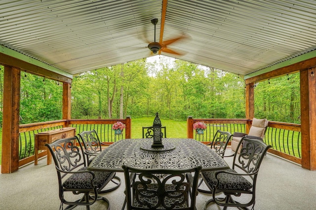 1494 Old Carriage Ct, Canal Winchester, OH 43110 - wooden terrace with outdoor dining space, a forest view, and a lawn