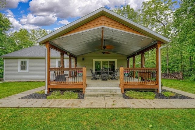 1494 Old Carriage Ct, Canal Winchester, OH 43110 - wooden deck featuring a ceiling fan, a yard, and outdoor dining area