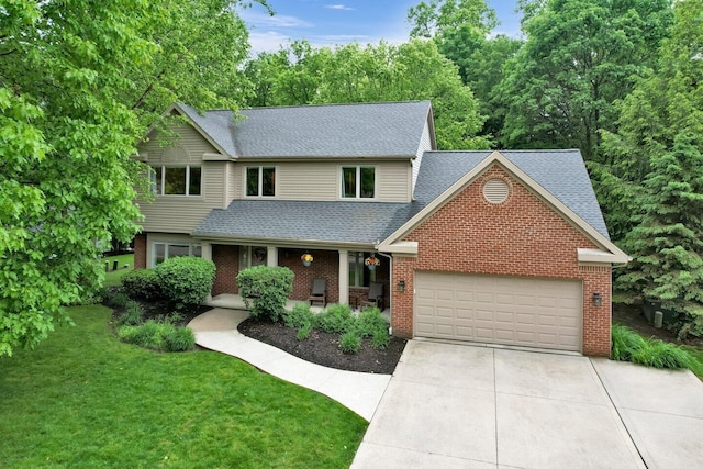 5528 Cypress Ct, Westerville, OH 43082 - view of front of home with roof with shingles, a garage, brick siding, driveway, and a front yard