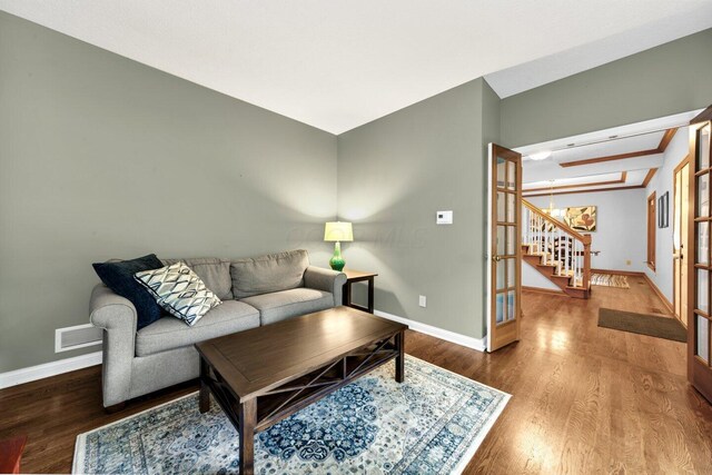 5528 Cypress Ct, Westerville, OH 43082 - living room with stairway, baseboards, and wood finished floors