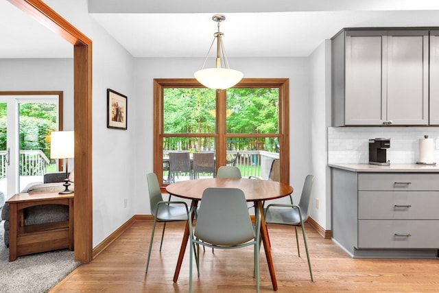 5528 Cypress Ct, Westerville, OH 43082 - dining space with light wood-type flooring and baseboards