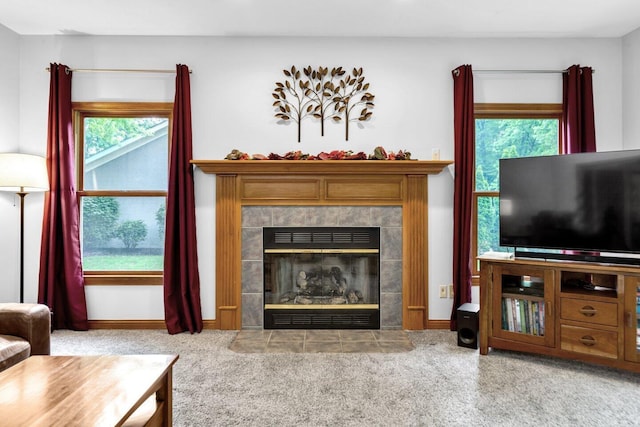 5528 Cypress Ct, Westerville, OH 43082 - carpeted living room with a tile fireplace and baseboards