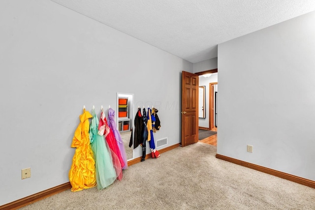5528 Cypress Ct, Westerville, OH 43082 - rec room featuring carpet flooring, baseboards, and a textured ceiling