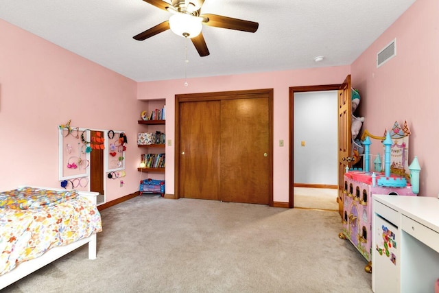 5528 Cypress Ct, Westerville, OH 43082 - bedroom with light carpet, a closet, baseboards, a ceiling fan, and a textured ceiling