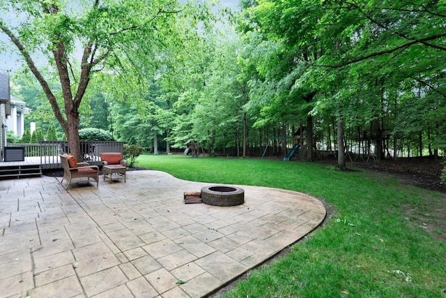 5528 Cypress Ct, Westerville, OH 43082 - view of patio / terrace with an outdoor fire pit, a playground, and a deck
