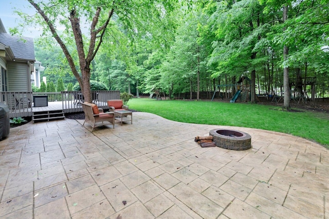 5528 Cypress Ct, Westerville, OH 43082 - view of patio / terrace featuring an outdoor fire pit, a playground, and a deck