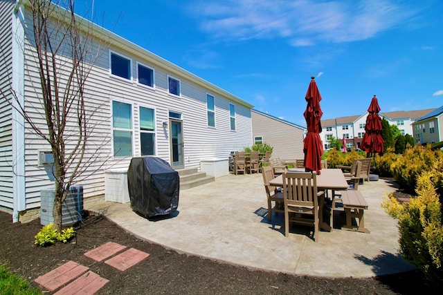 5933 Lakemont Dr, Westerville, OH 43081 - view of patio / terrace featuring outdoor dining area, central AC, and area for grilling
