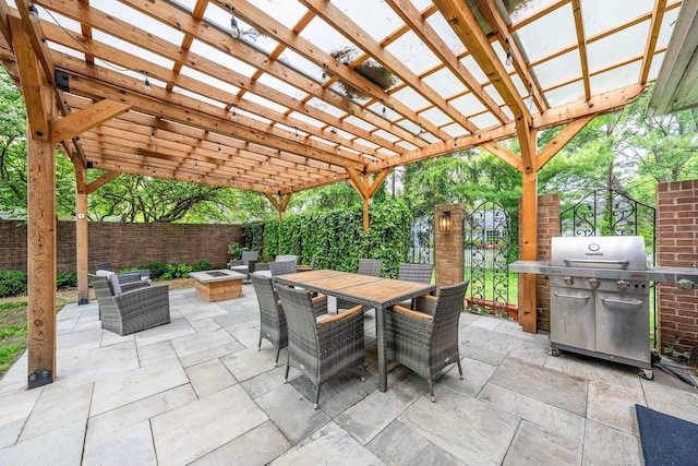 4465 Loos Cir E, Columbus, OH 43214 - fenced backyard featuring area for grilling, a fire pit, a patio area, outdoor dining space, and a pergola