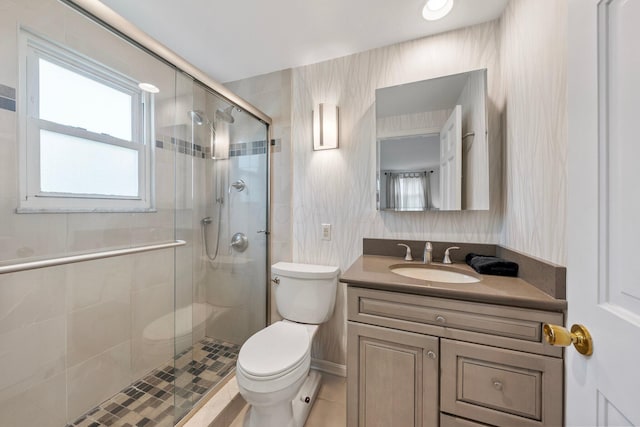 4465 Loos Cir E, Columbus, OH 43214 - bathroom with toilet, a stall shower, vanity, and tile patterned flooring