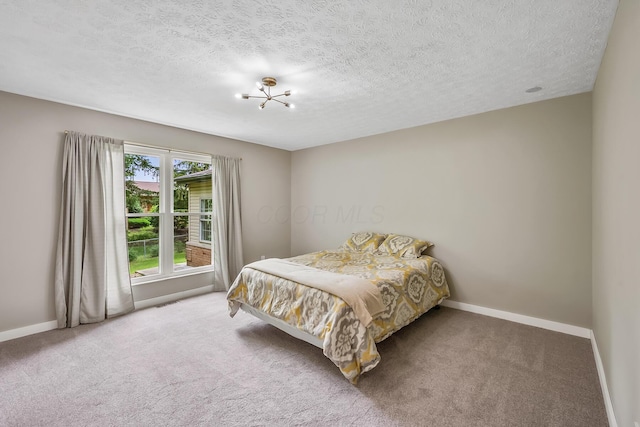 590 Haversham Dr, Gahanna, OH 43230 - carpeted bedroom featuring baseboards and a textured ceiling