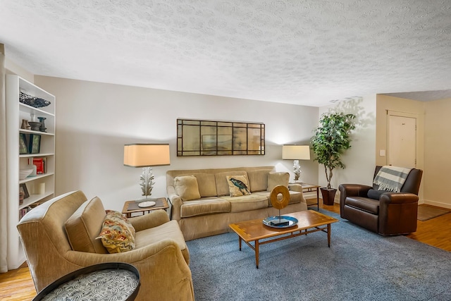 590 Haversham Dr, Gahanna, OH 43230 - living area with a textured ceiling and wood finished floors