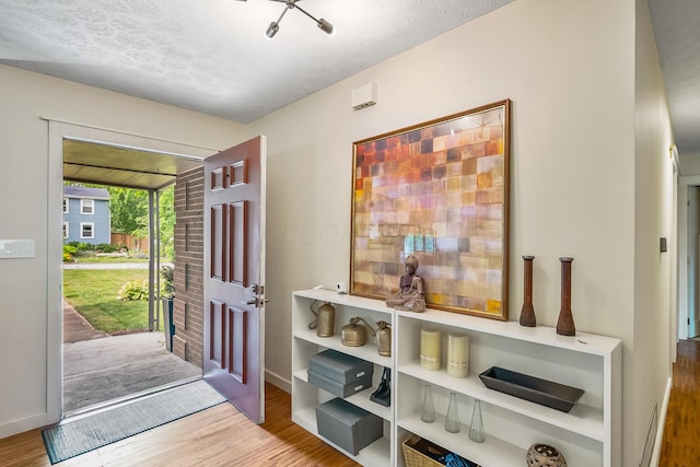 590 Haversham Dr, Gahanna, OH 43230 - foyer featuring wood finished floors and a textured ceiling