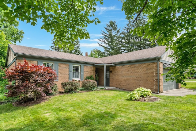 590 Haversham Dr, Gahanna, OH 43230 - ranch-style house featuring brick siding, a garage, a front lawn, and a chimney