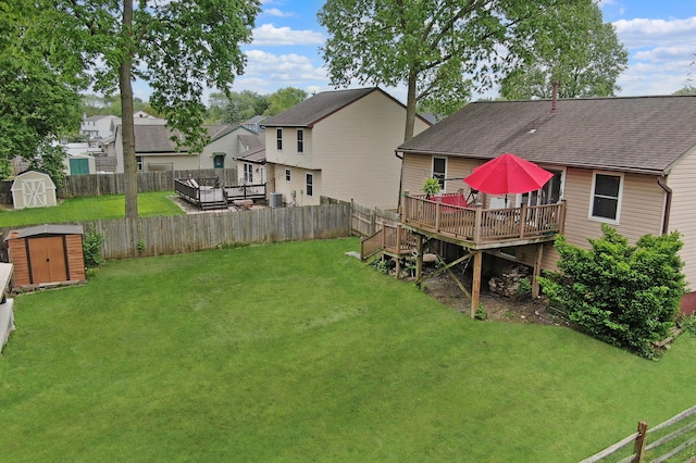 6024 Winterberry Dr, Galloway, OH 43119 - view of yard with a deck, a residential view, and central AC