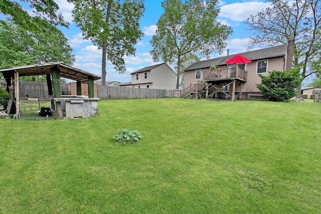 6024 Winterberry Dr, Galloway, OH 43119 - view of yard with stairway and a wooden deck