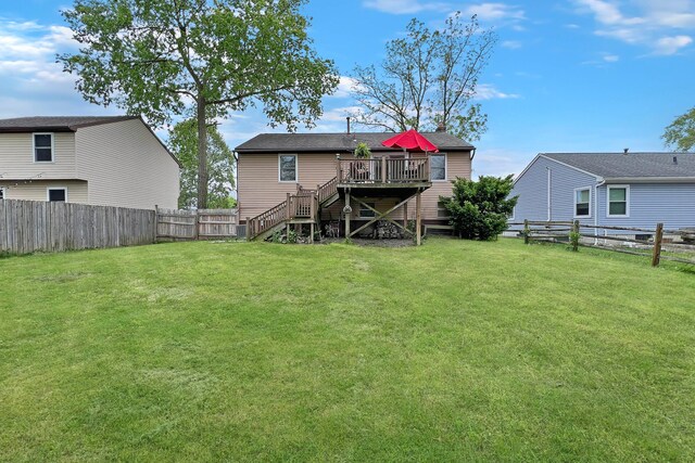 6024 Winterberry Dr, Galloway, OH 43119 - rear view of house featuring stairway and a deck