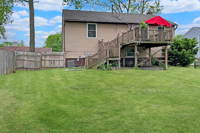 6024 Winterberry Dr, Galloway, OH 43119 - back of property with stairs, a wooden deck, and cooling unit