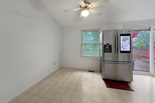 6024 Winterberry Dr, Galloway, OH 43119 - kitchen featuring stainless steel fridge with ice dispenser, lofted ceiling, baseboards, ceiling fan, and light floors