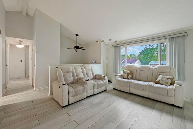 6024 Winterberry Dr, Galloway, OH 43119 - living area with light wood-type flooring, a ceiling fan, beamed ceiling, high vaulted ceiling, and baseboards