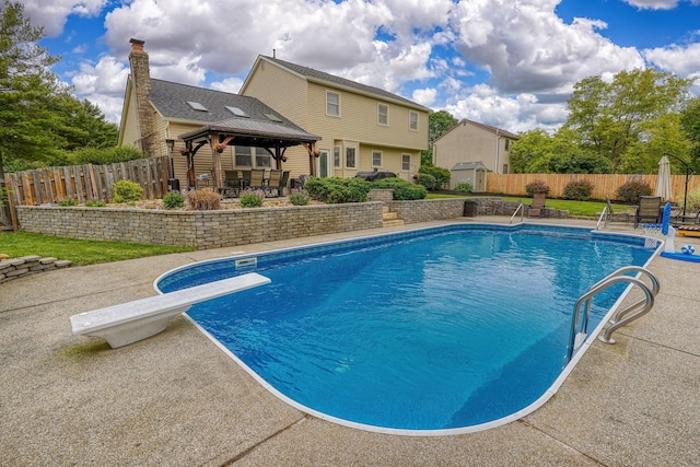 12179 Woodrow Ln, Pickerington, OH 43147 - view of pool featuring a gazebo, a patio, a diving board, and a fenced backyard