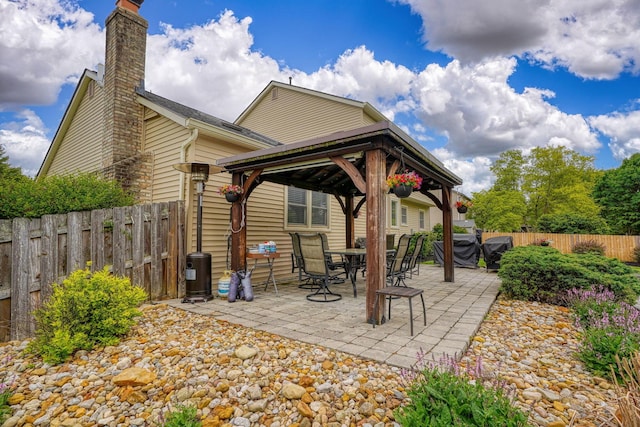 12179 Woodrow Ln, Pickerington, OH 43147 - fenced backyard featuring a gazebo and a patio