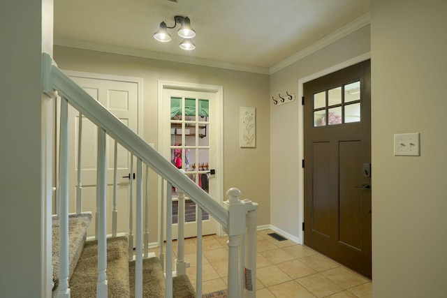 12179 Woodrow Ln, Pickerington, OH 43147 - entrance foyer with stairway, crown molding, light tile patterned floors, and baseboards