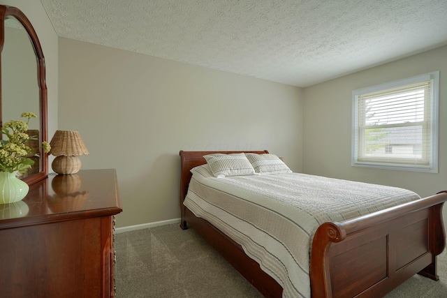 12179 Woodrow Ln, Pickerington, OH 43147 - bedroom with carpet flooring, baseboards, and a textured ceiling
