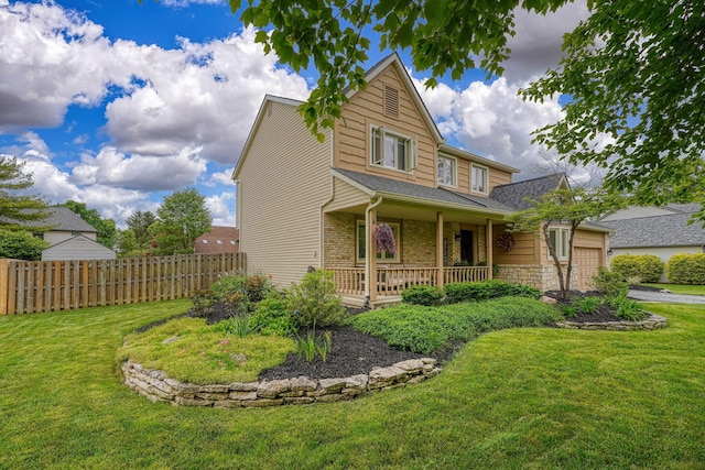 12179 Woodrow Ln, Pickerington, OH 43147 - traditional-style house featuring a porch, a garage, and stone siding