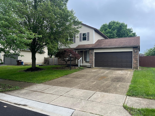 507 Warwick Ln, Pickerington, OH 43147 - view of front of home featuring brick siding, an attached garage, driveway, and a shingled roof