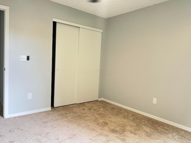 507 Warwick Ln, Pickerington, OH 43147 - unfurnished bedroom with carpet floors, a closet, and baseboards