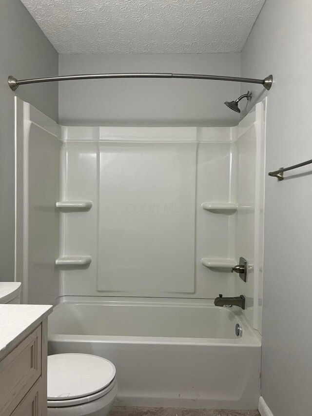 507 Warwick Ln, Pickerington, OH 43147 - full bathroom with vanity, a textured ceiling, toilet, and bathtub / shower combination