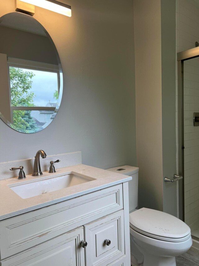 507 Warwick Ln, Pickerington, OH 43147 - bathroom featuring toilet, a shower stall, and vanity