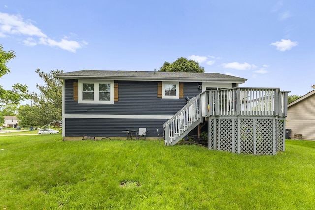 7263 Saddletree Ct, Reynoldsburg, OH 43068 - back of property featuring a wooden deck, stairway, and a lawn