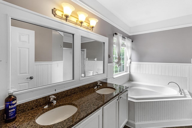 8699 Lazelle Commons Dr, Lewis Center, OH 43035 - bathroom featuring a wainscoted wall, a garden tub, and double vanity