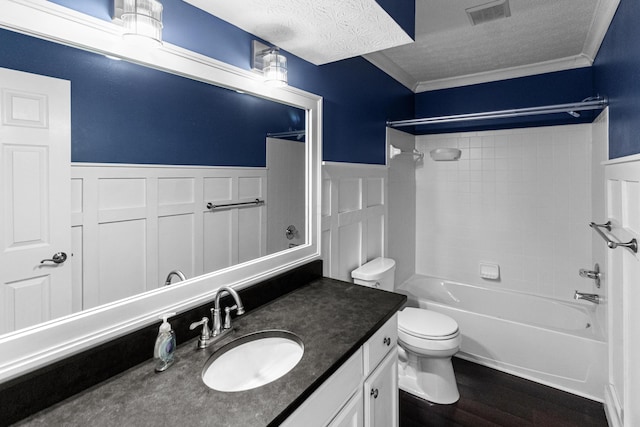8699 Lazelle Commons Dr, Lewis Center, OH 43035 - full bath with a textured ceiling, toilet, wood finished floors, ornamental molding, and vanity