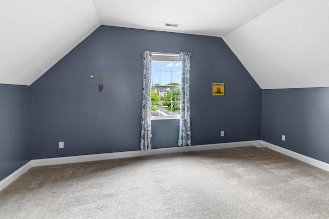 8699 Lazelle Commons Dr, Lewis Center, OH 43035 - bonus room featuring lofted ceiling, carpet flooring, and baseboards