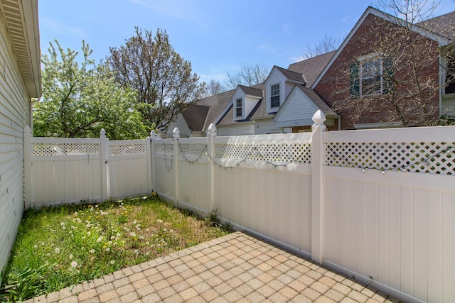 8699 Lazelle Commons Dr, Lewis Center, OH 43035 - fenced backyard featuring a patio area