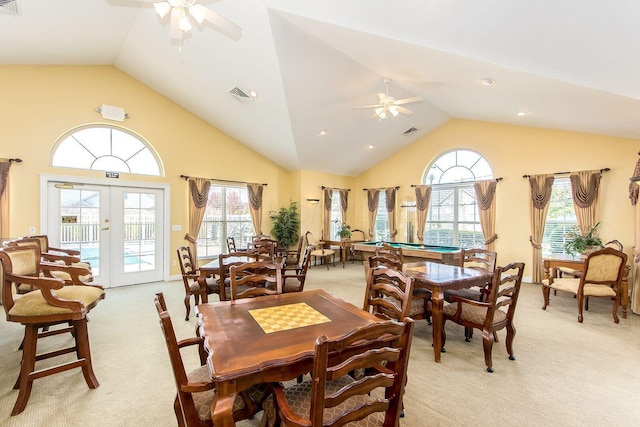 6681 Lakeview Cir, Canal Winchester, OH 43110 - dining space with ceiling fan, light carpet, french doors, and high vaulted ceiling