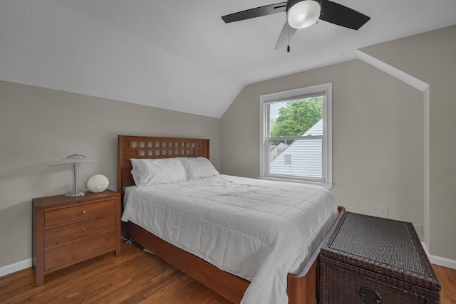 198 Loveman Ave, Worthington, OH 43085 - bedroom with wood finished floors, vaulted ceiling, a ceiling fan, and baseboards