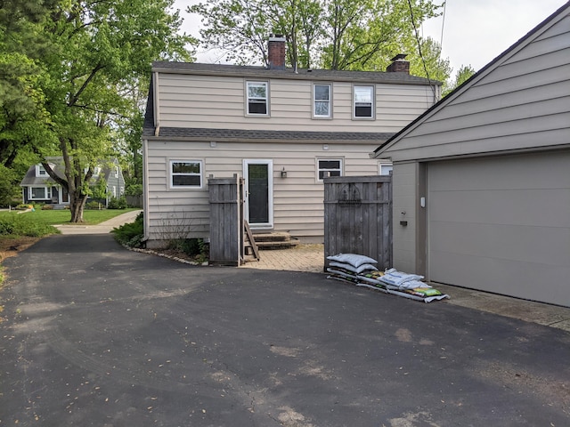 198 Loveman Ave, Worthington, OH 43085 - view of front of home featuring a chimney and a shingled roof