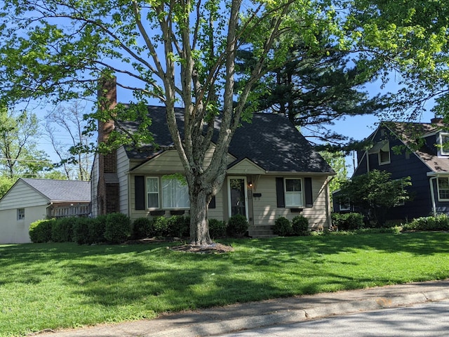 198 Loveman Ave, Worthington, OH 43085 - view of front facade with a front lawn and a chimney