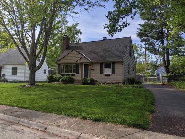 198 Loveman Ave, Worthington, OH 43085 - view of front of house with a chimney and a shingled roof