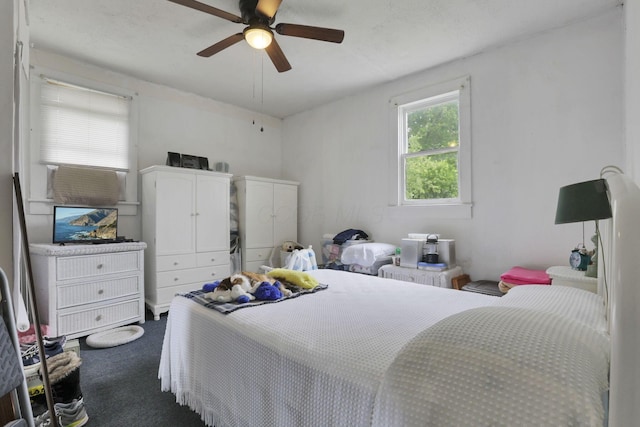 936 Washington Ave, Lancaster, OH 43130 - bedroom with dark colored carpet and ceiling fan